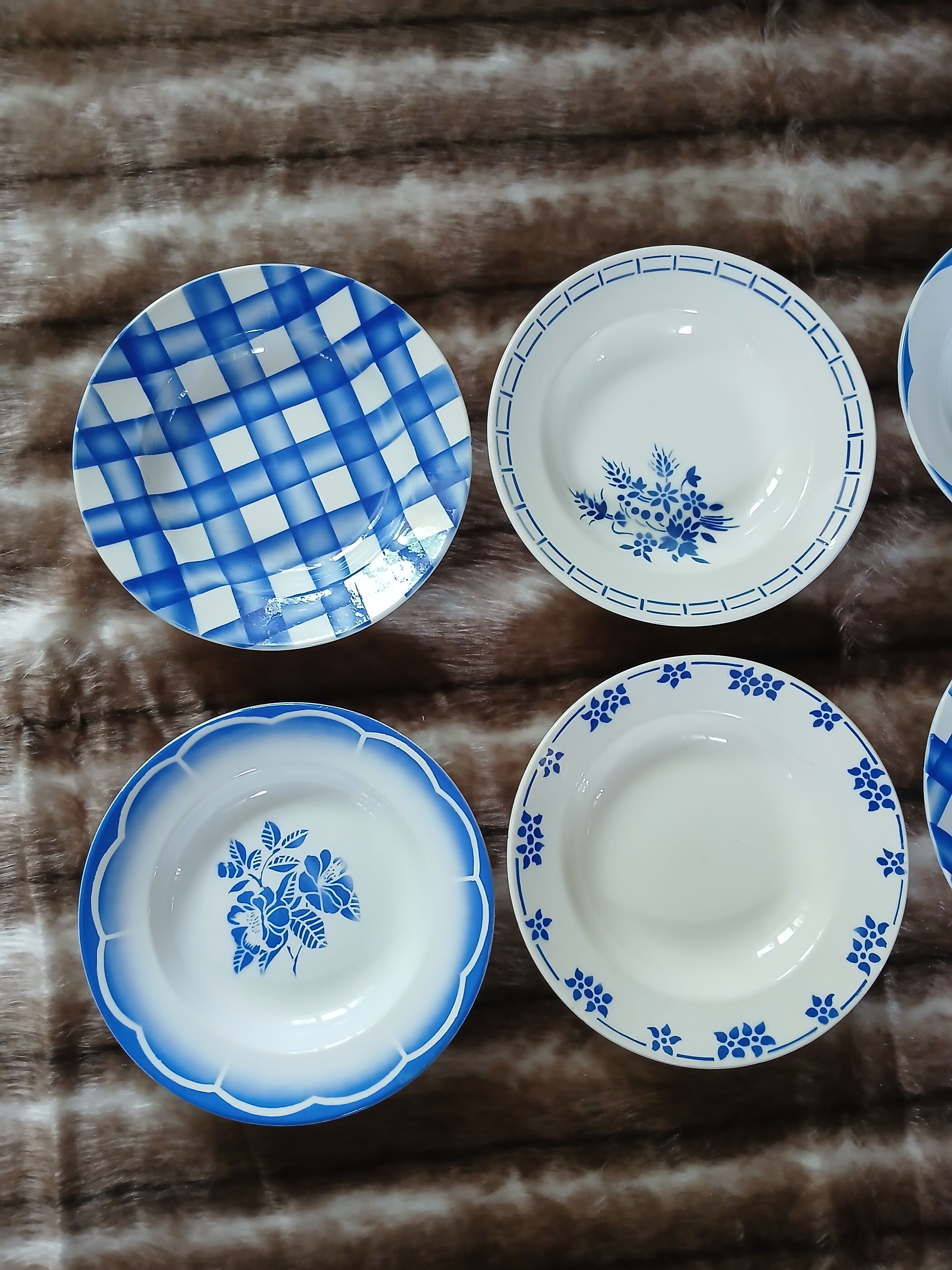 8 mismatched antique deep plates