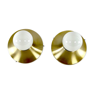 Stilux Milano, vintage round gilded aluminum wall lamps from 60s. Set of two