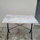 Marble and cast iron restaurant bistro table