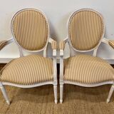 Pair of Louis XVI style medallion armchairs