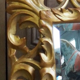 Mirror, late 19th century, carved wood, gilded stucco.