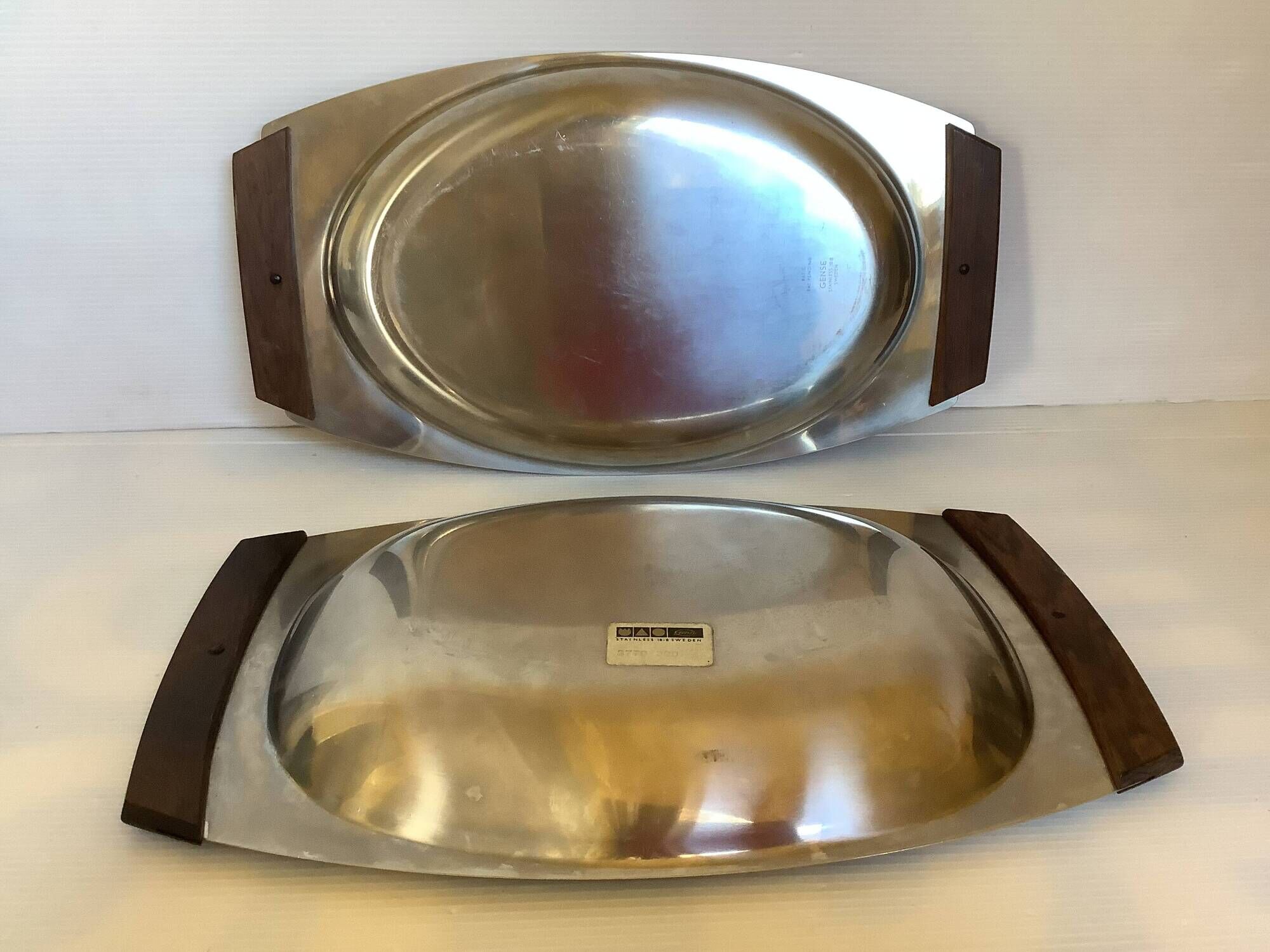 Duo of Scandinavian teak wood metal dishes