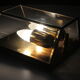 Wall sconce in brass and glass
