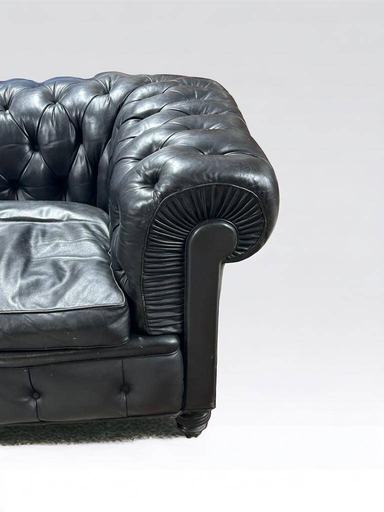 Large and old four-seater leather chesterfield sofa early 20th century l 260 cm
