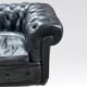 Large and old four-seater leather chesterfield sofa early 20th century l 260 cm