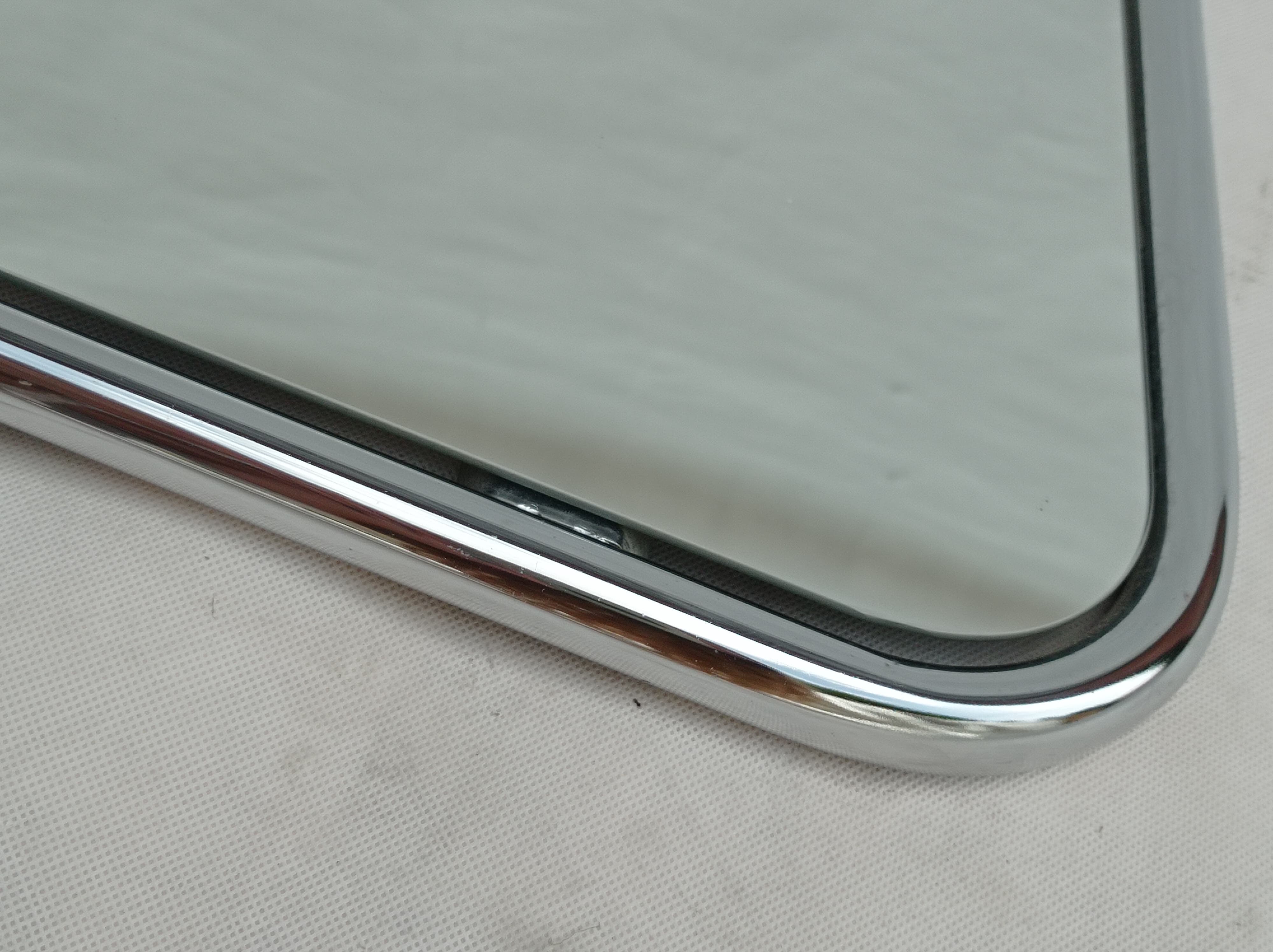 Miroir design en forme de triangle des années 70, véritable ère spatiale