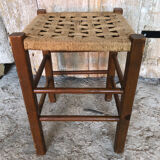 Wooden stool with woven rope seat