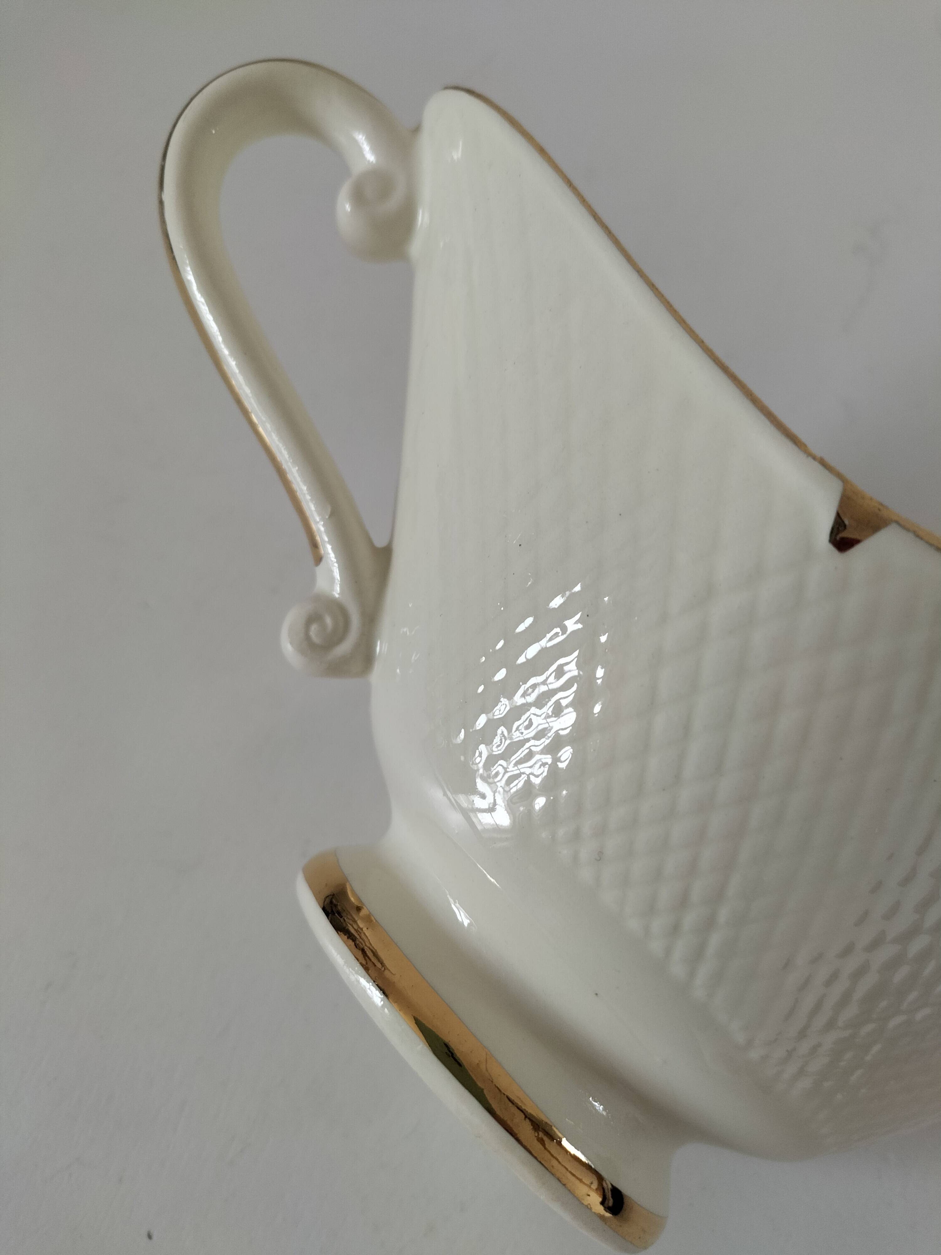 Sauceboat Salins France stylised floral decoration