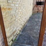 Art Deco oak mirror with bevelled glass from the 1930s.