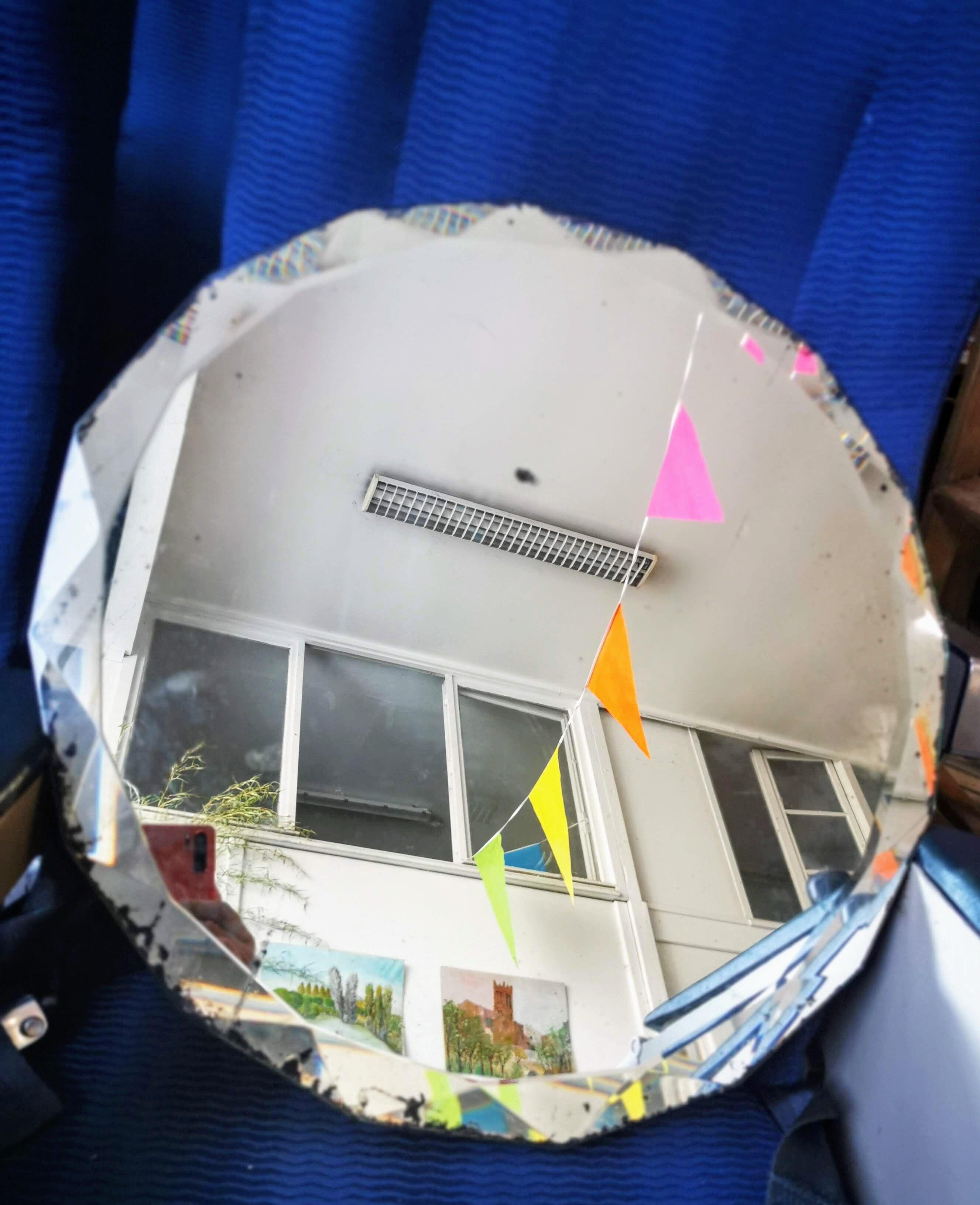 Bevelled round mirror 49cm