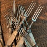 Set of coat of arms fruit cutlery