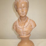 Old bust of a child in platre