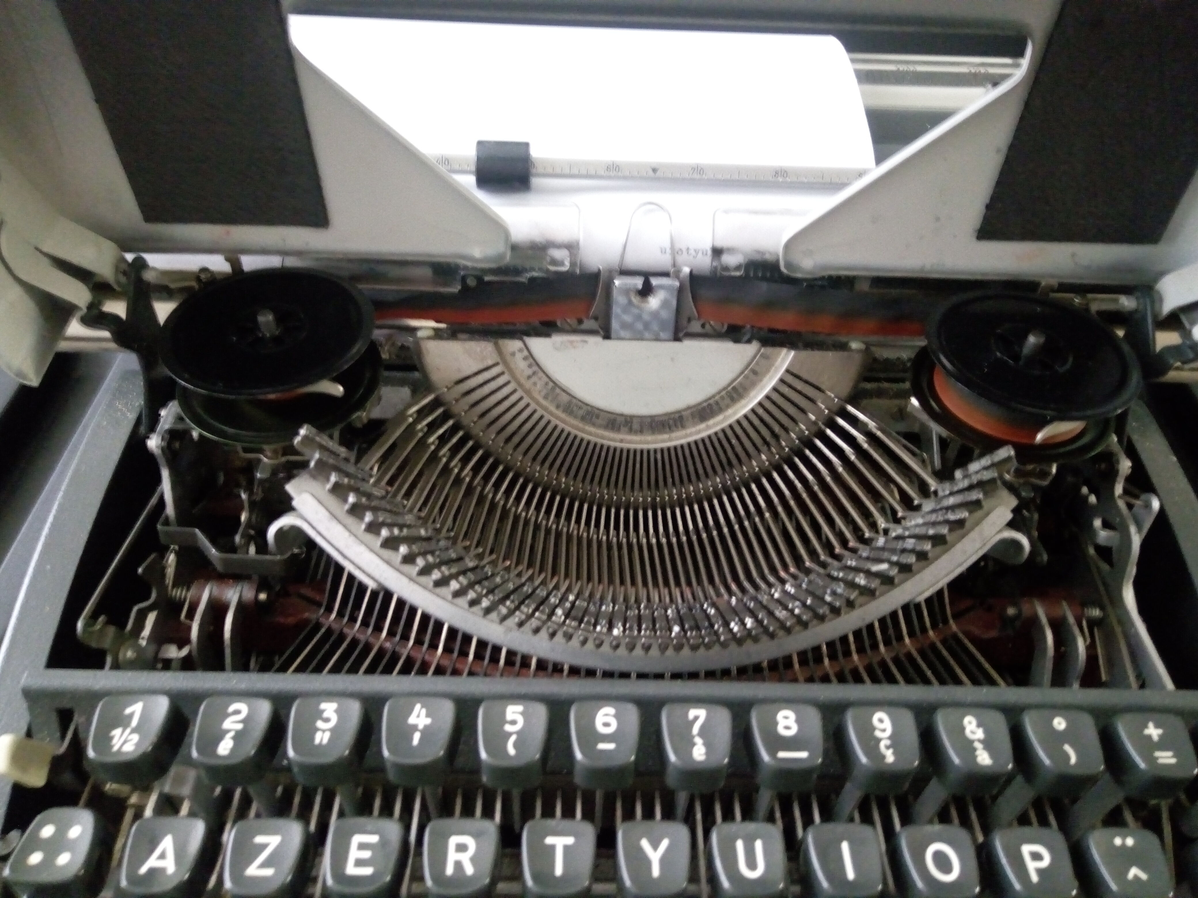 Olympia typewriter in his suitcase