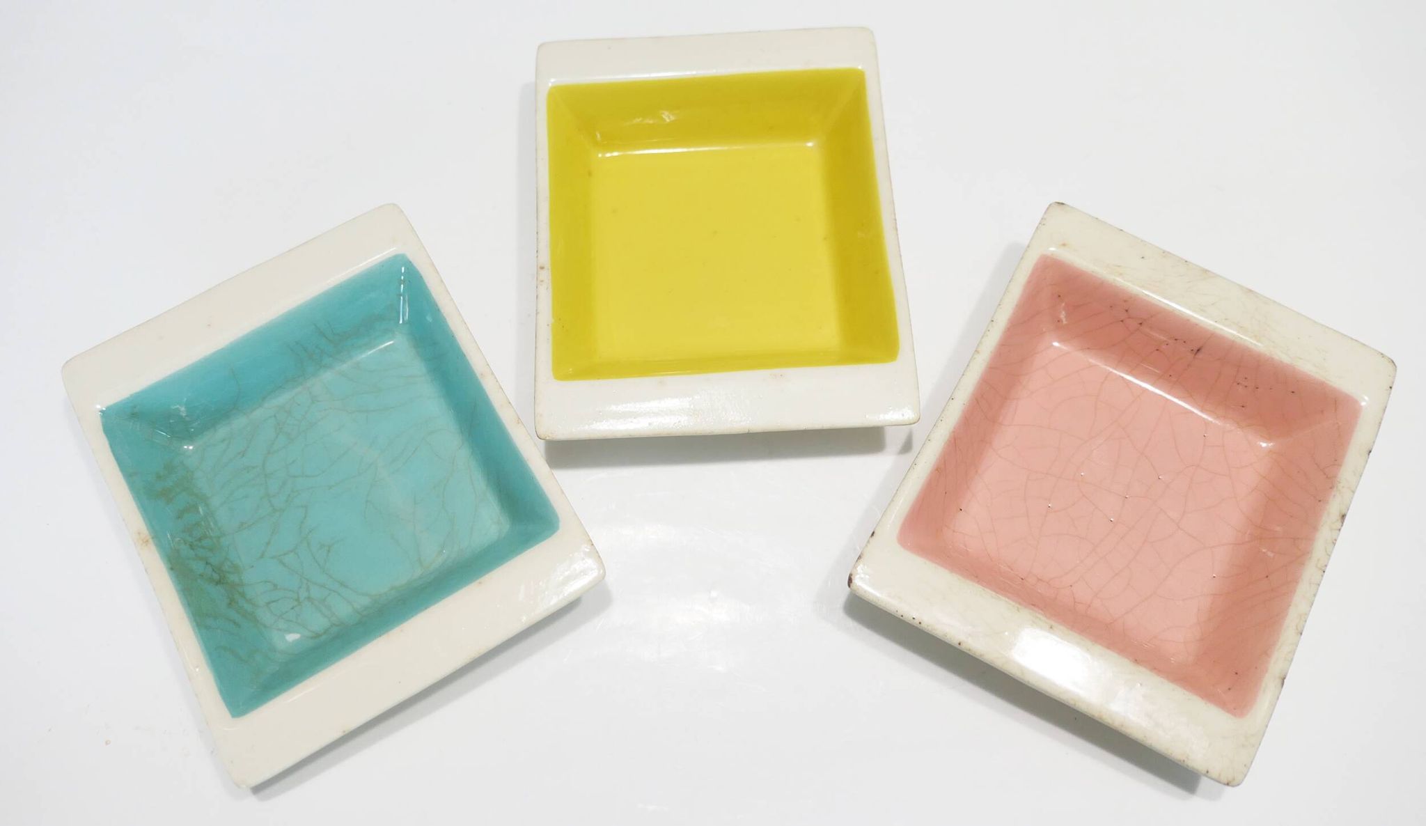 Set of three German ceramic catchalls from the 1950s.