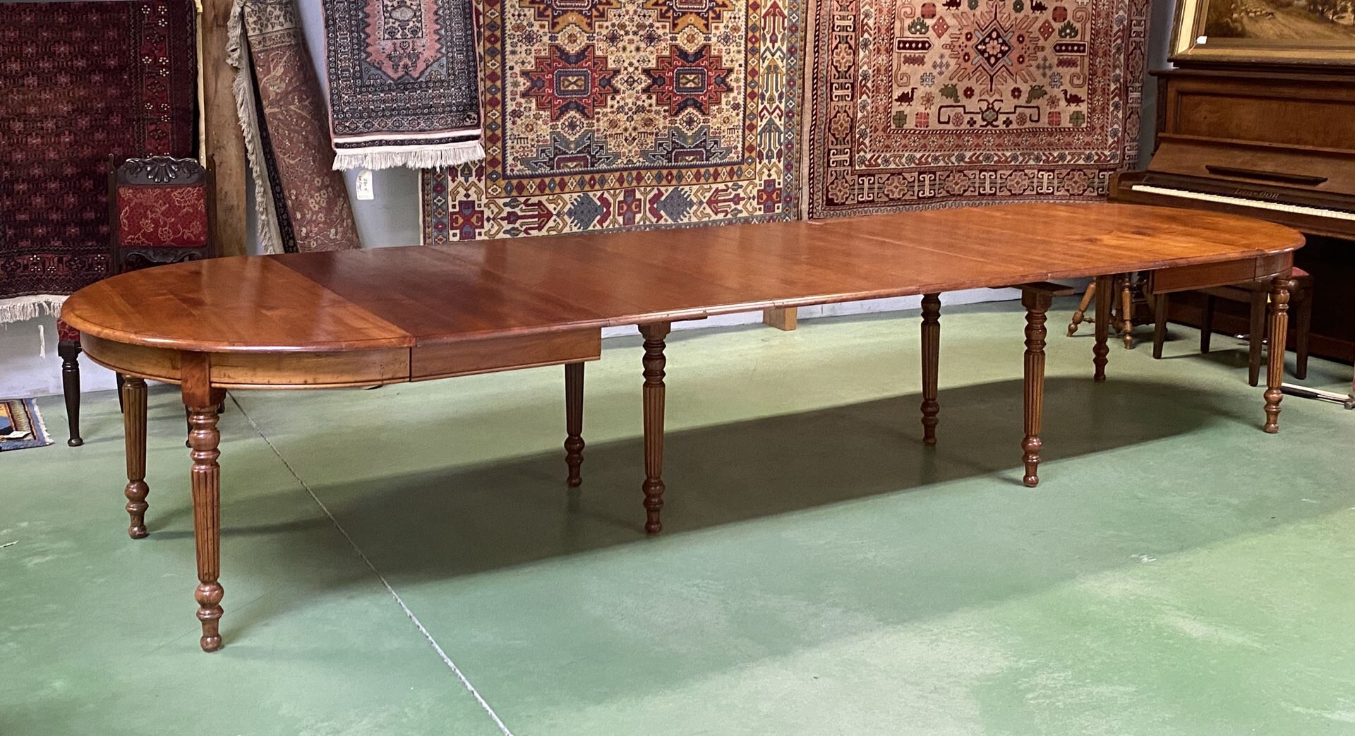 Louis Philippe round table 8 feet in cherry with 6 extensions