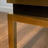 Coffee table in brass and black lacquer by Guy Lefèvre for Maison Jansen