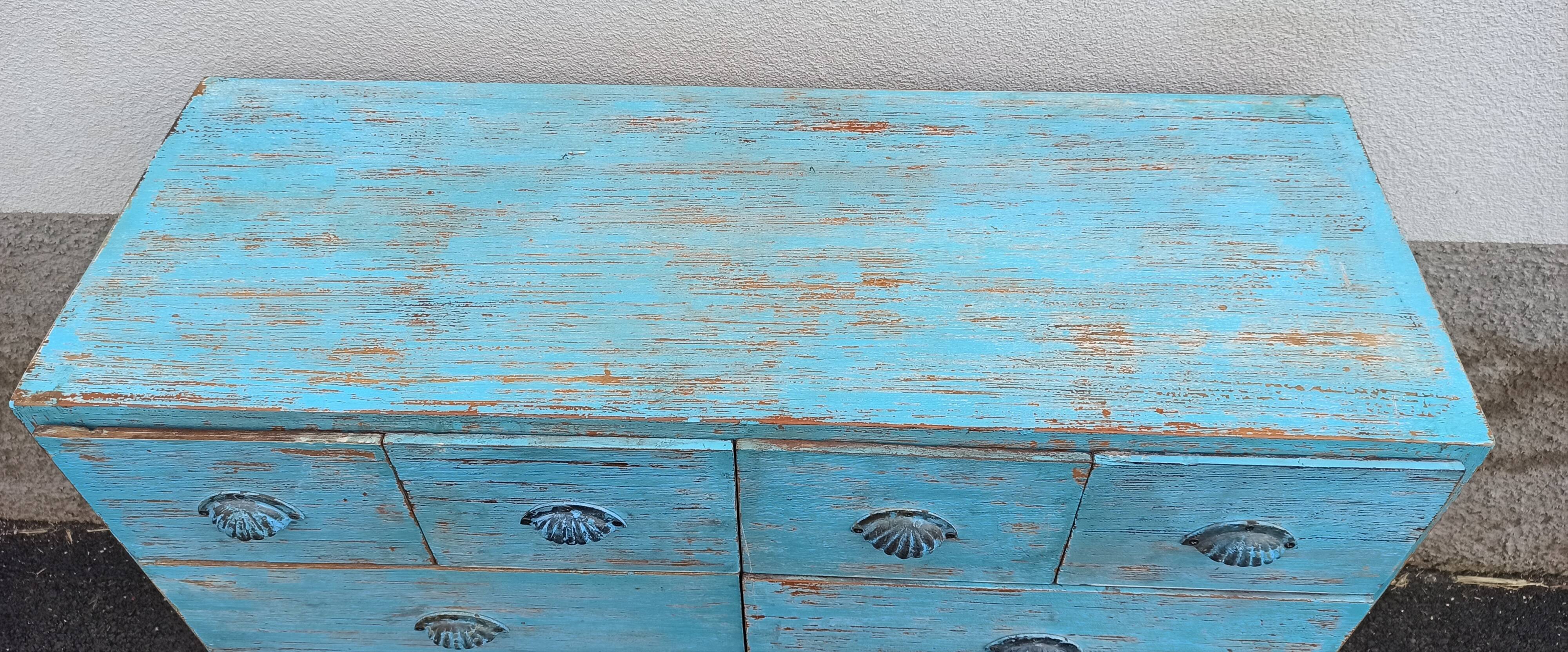 Blue wooden dresser with drawers
