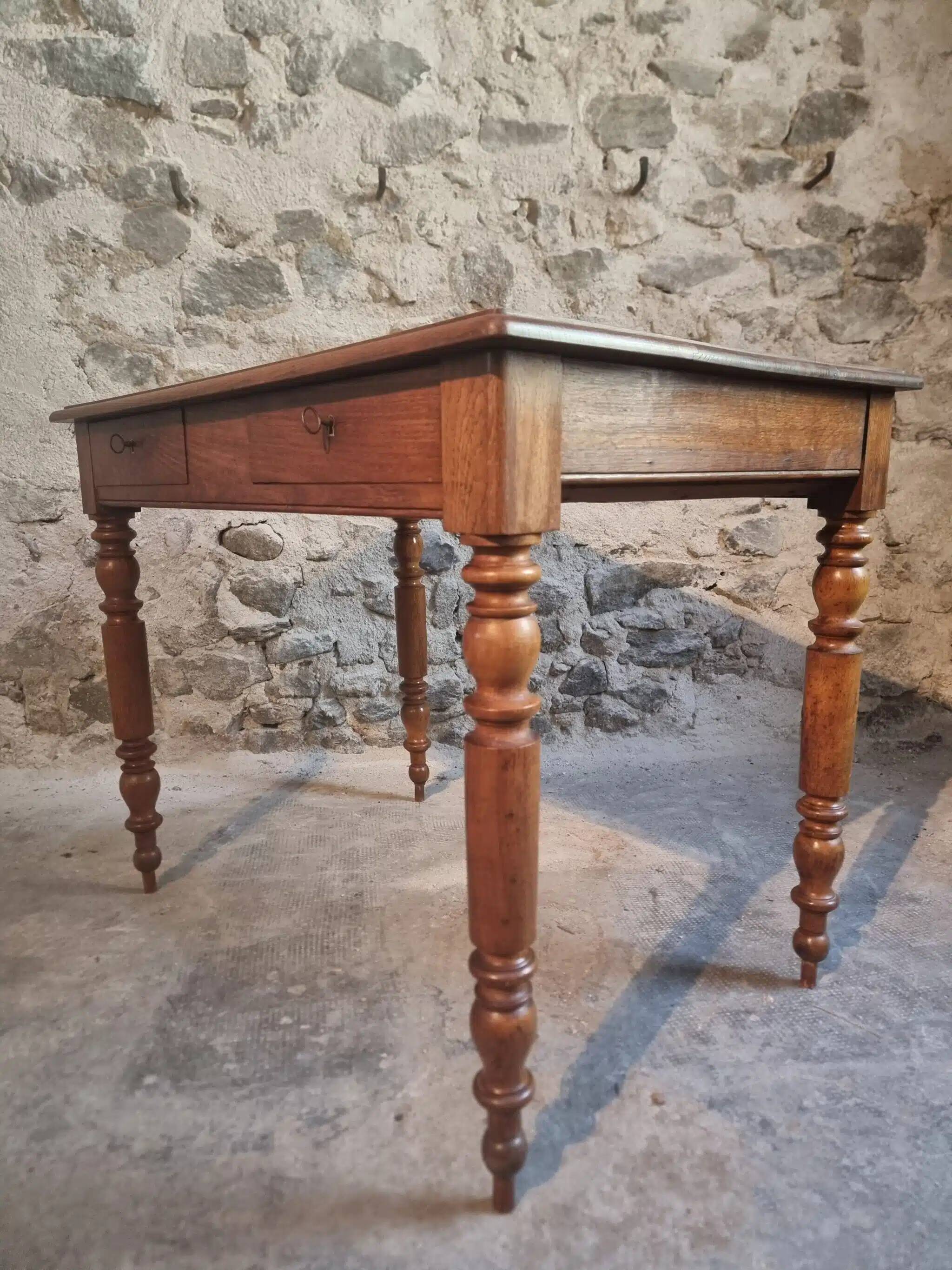 Antique French oak writing desk with 2 lockable drawers, circa 1920.