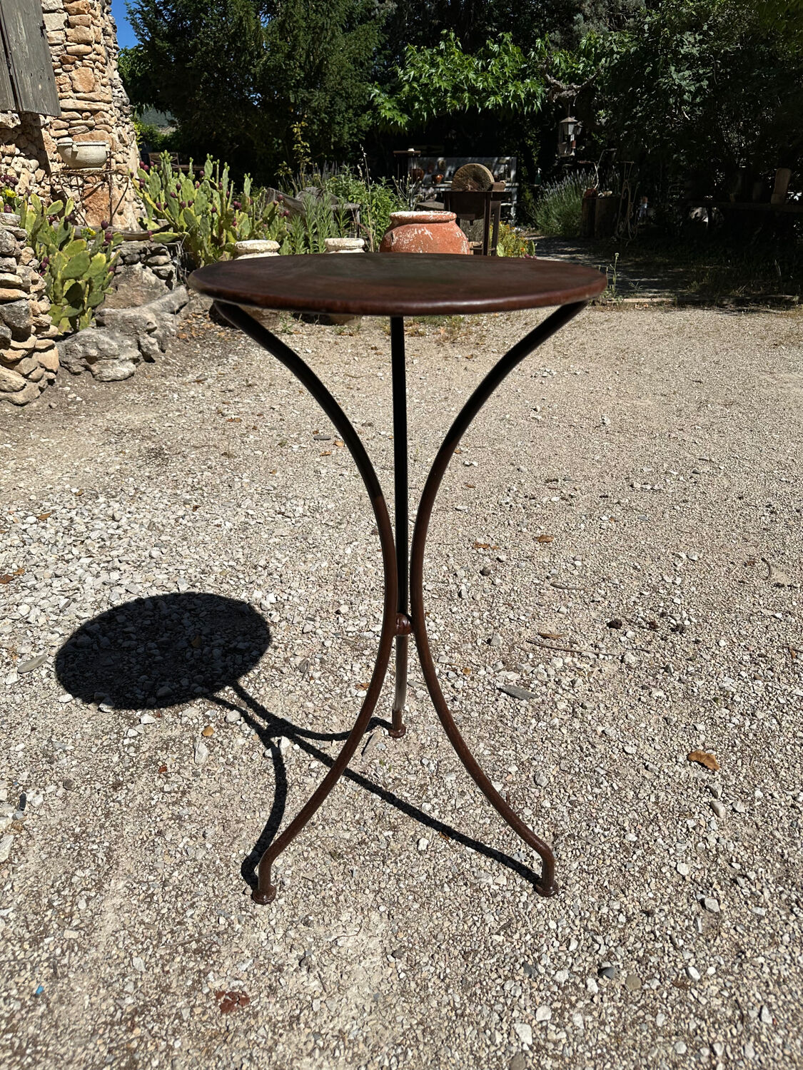 Artisanal wrought iron side table