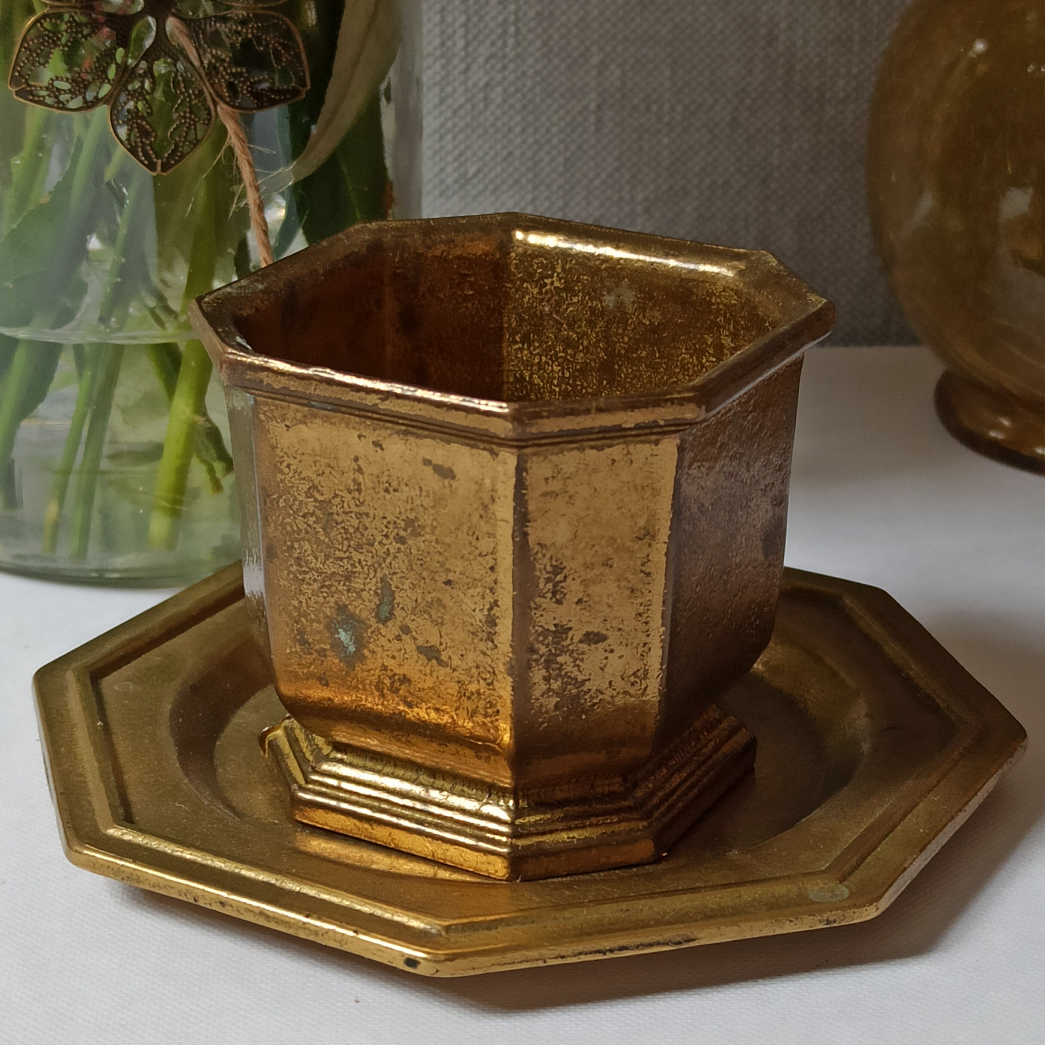 Varnished brass pot on saucer from the 80s