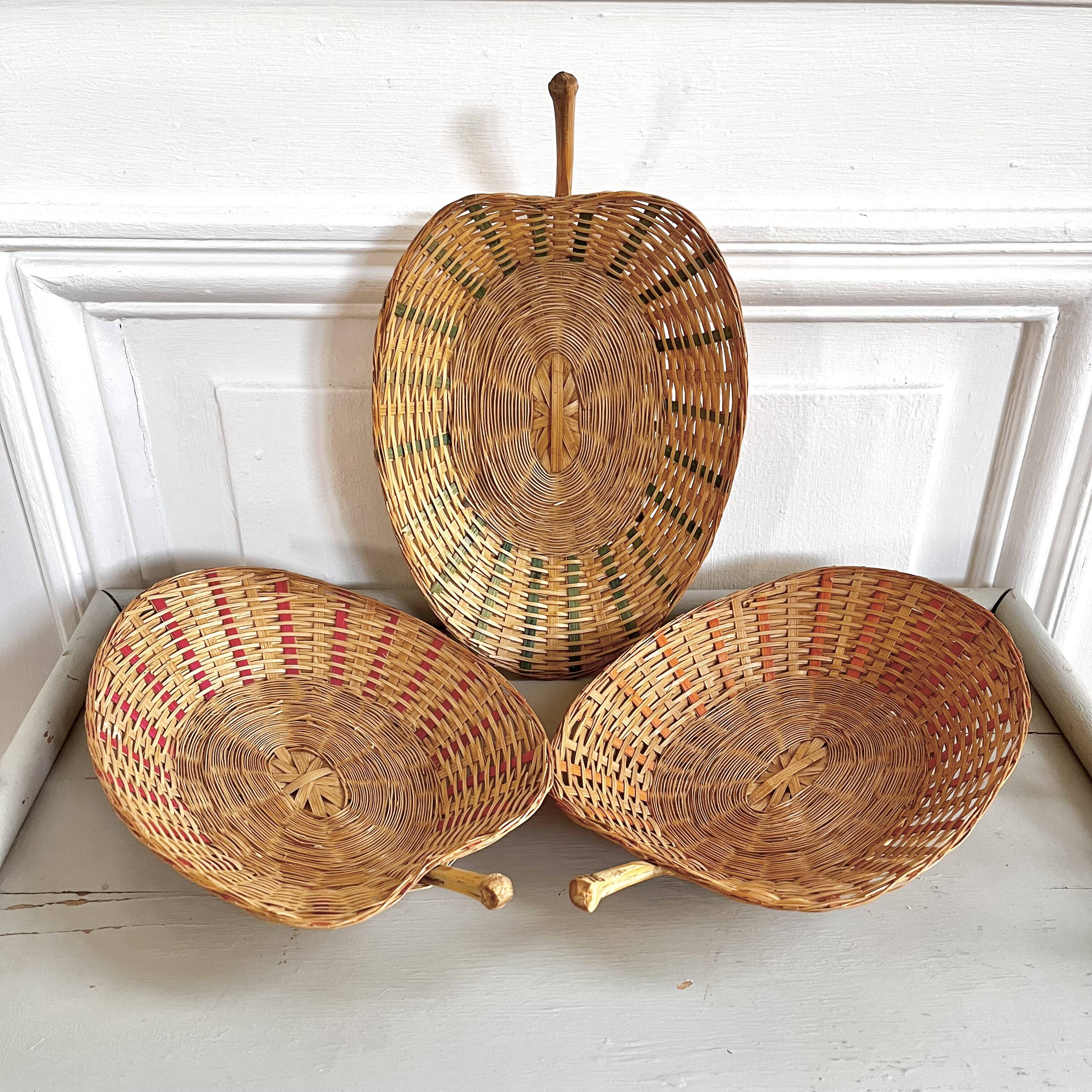 Trio of vintage wicker and bamboo baskets