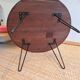 Round coffee table with mahogany wood top