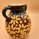 Brown and yellow daisy ceramic vase
