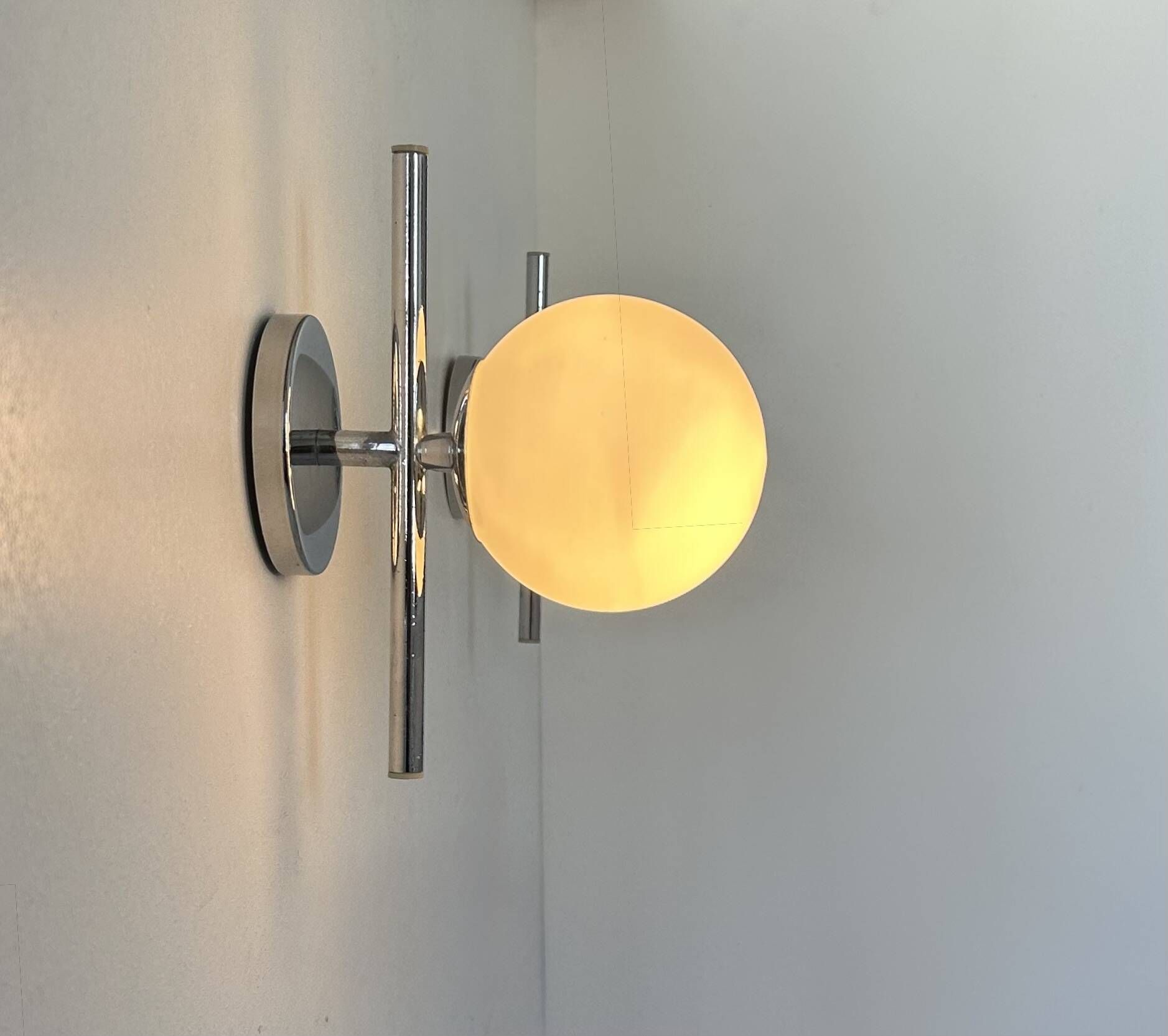 Pair of vintage chrome and opaline wall lights, France 1970.