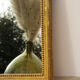 Miroir en bois doré avec moulure perlée - 70x46cm