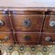 Small "crossbow" chest of drawers, Louis XV style, in walnut