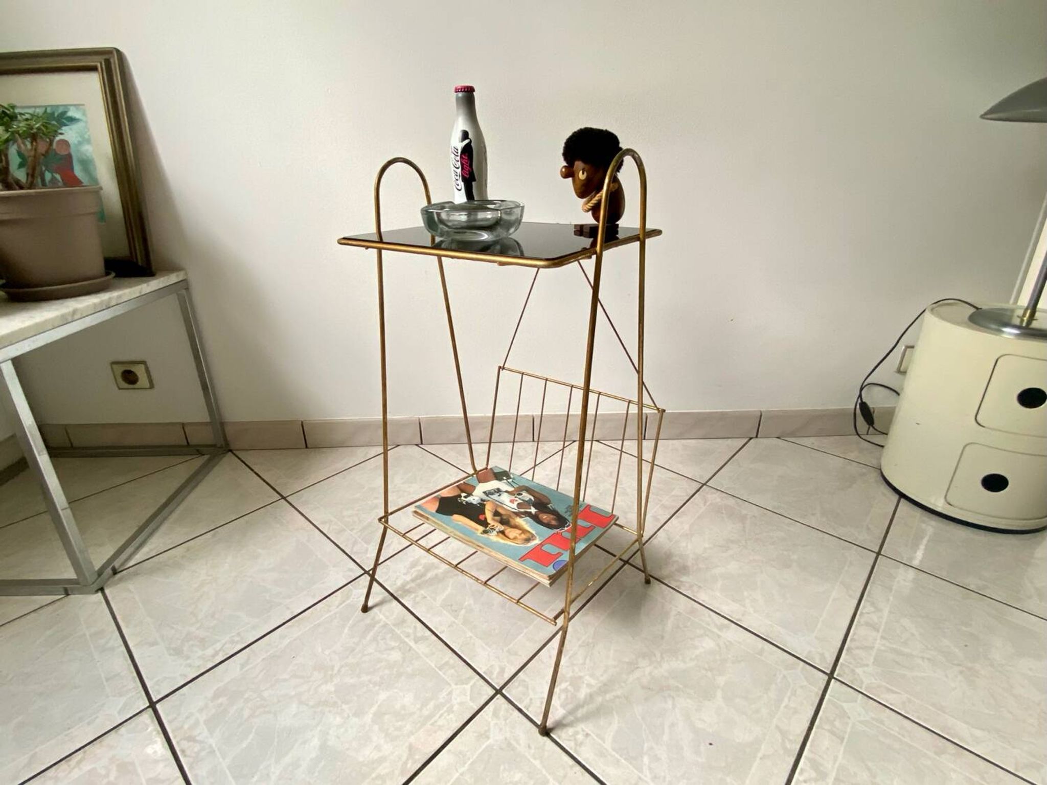 Vintage 1960s brass and smoked glass side table with magazine holder.