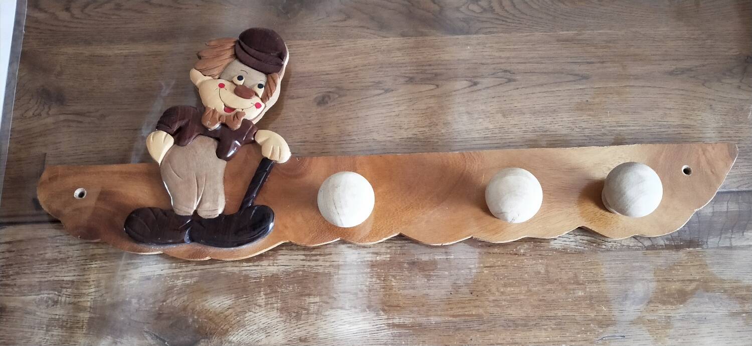 Wooden clown coat rack