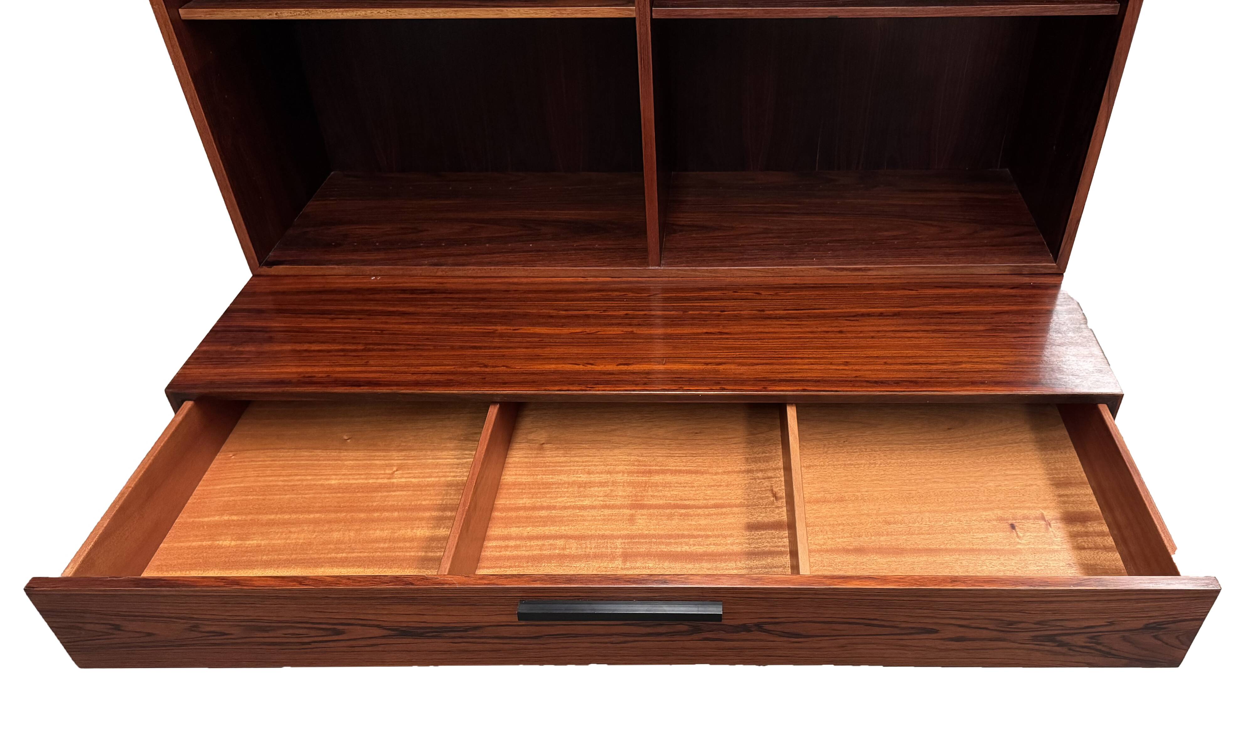 Scandinavian library in rosewood designed by Ib Kofod Larsen.