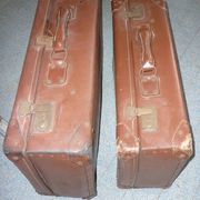 Pair of red suitcases from the 1950s