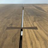 Exceptional dining table in solid walnut.