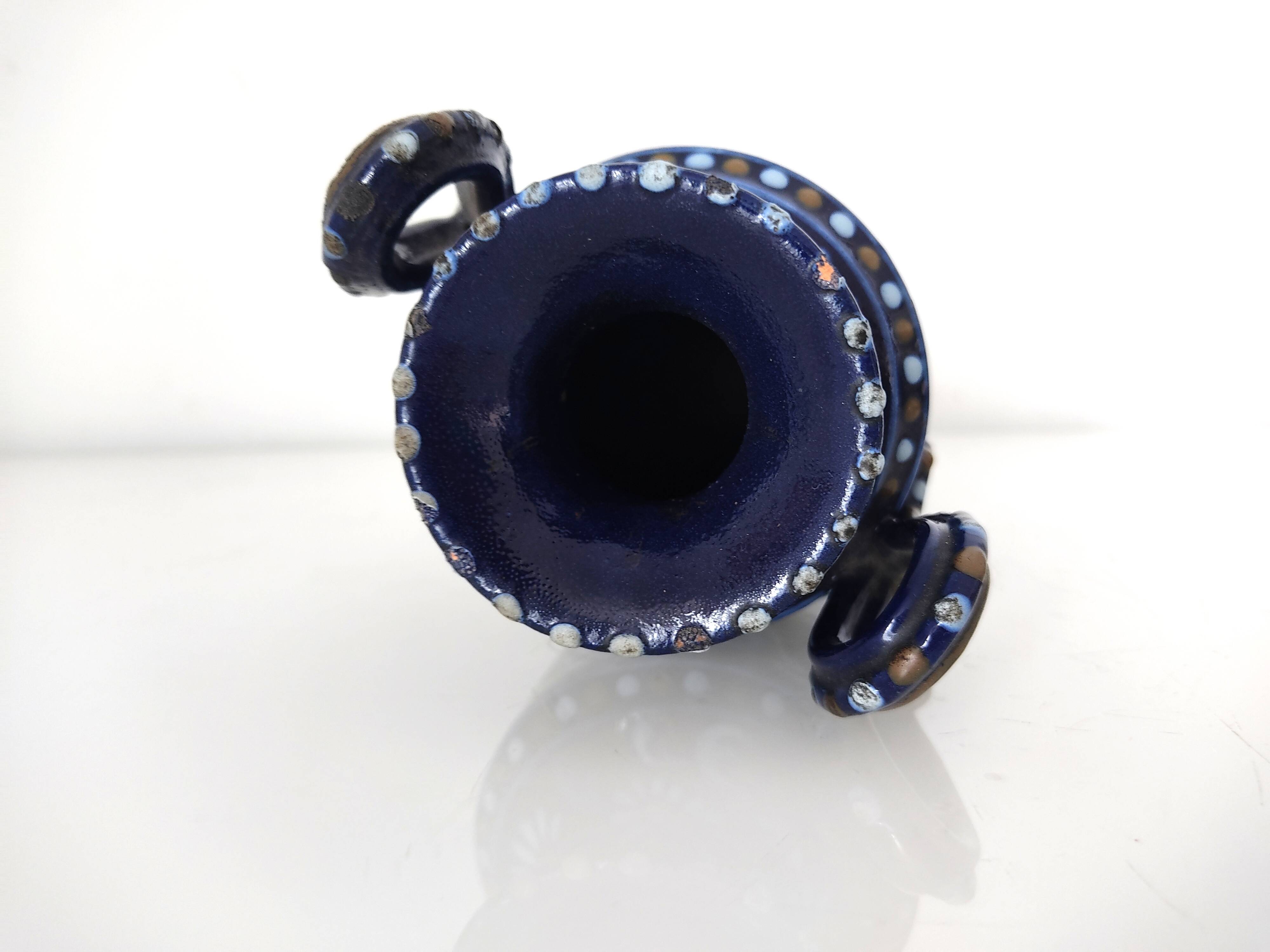 Small blue vase with birds