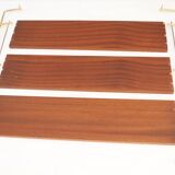 Wooden and brass shelves