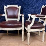Pair of Louis XVI cabriolet armchairs in lacquered wood and leather circa 1850