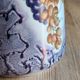 Vintage porcelain pitcher Lusseray France, decorated with grape clusters.