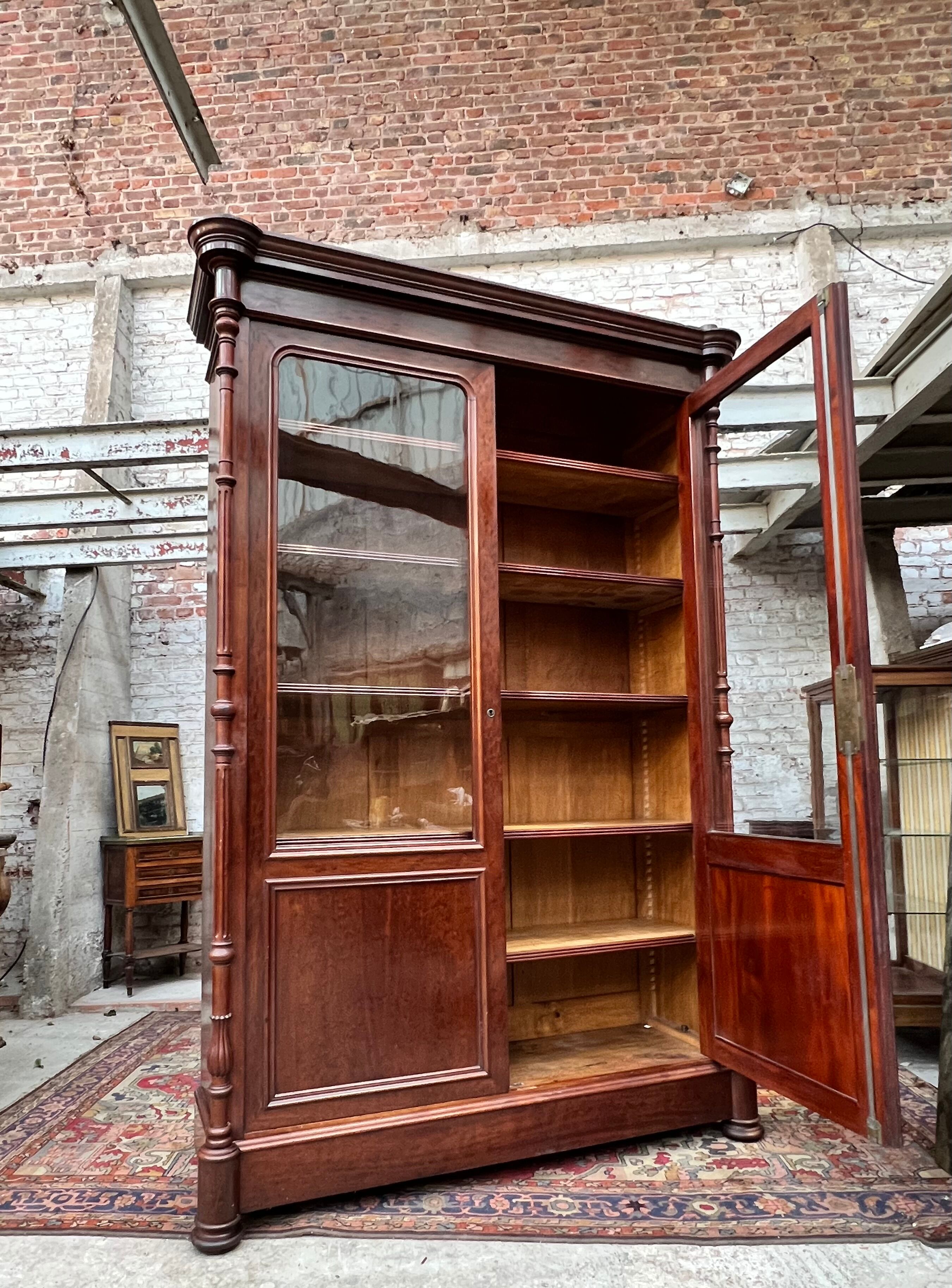 Speckled mahogany bookcase of Napoleon III XIX century