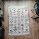 Moroccan white rug with Berber patterns.