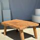 Coffee table in blond teak quadripod