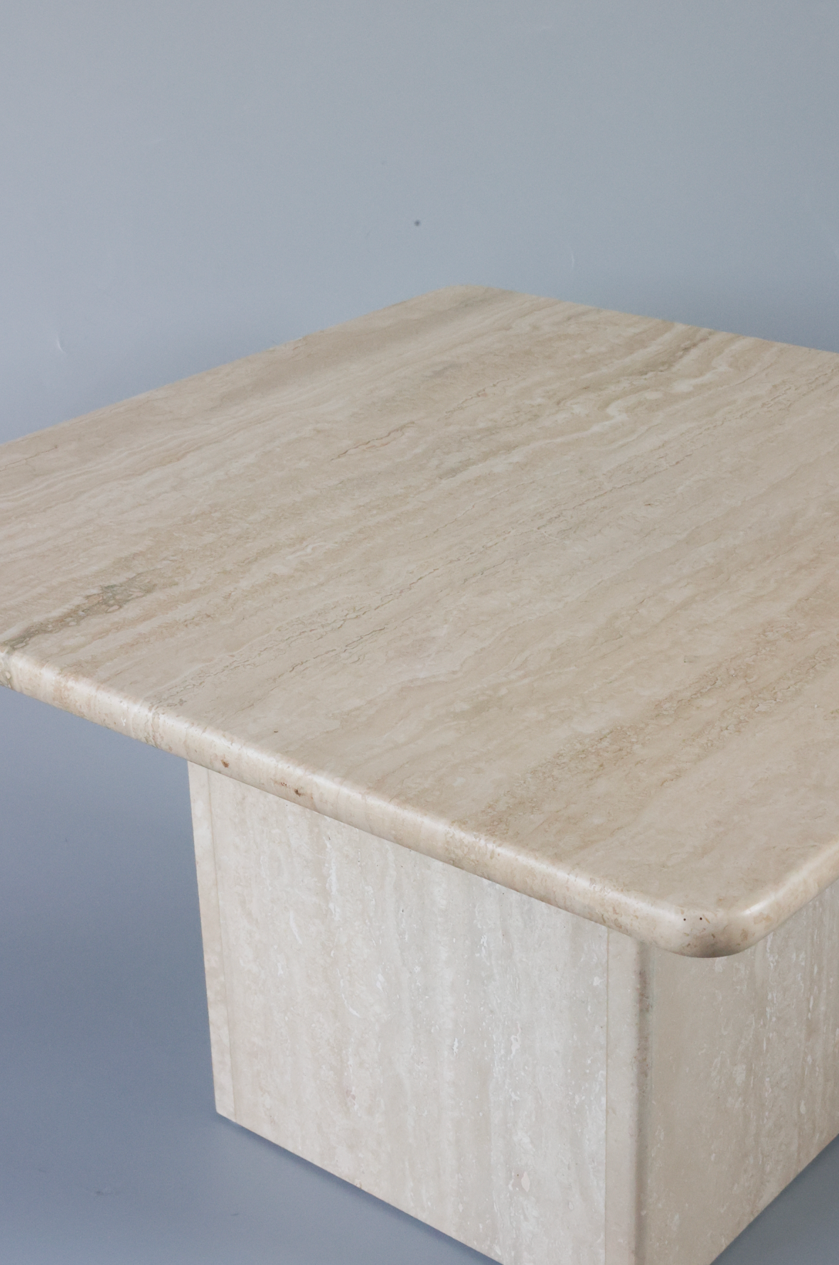 Travertine side table
