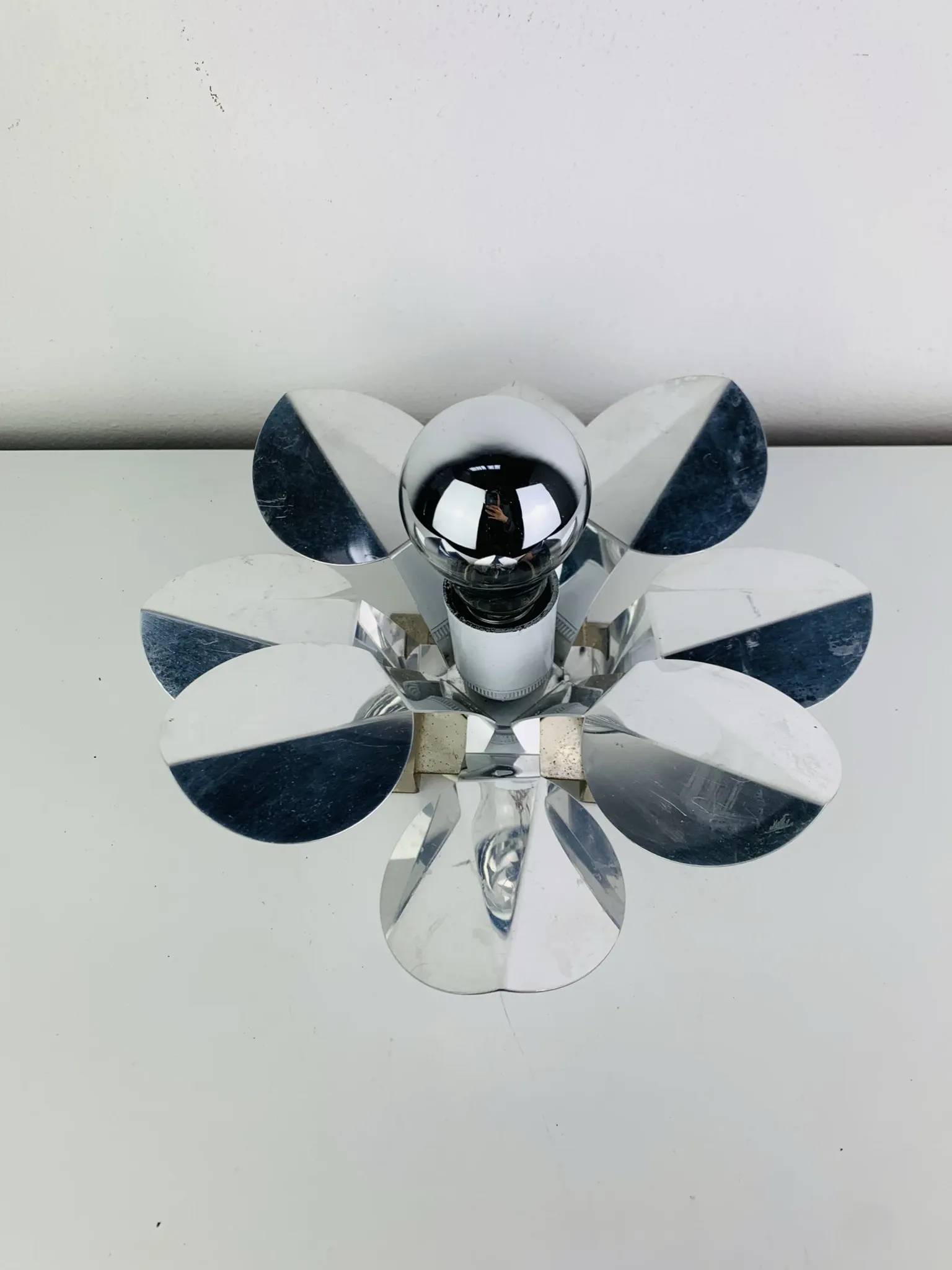 Space Age chrome flower wall light from the 1960s.