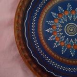 Plate in painted sandstone