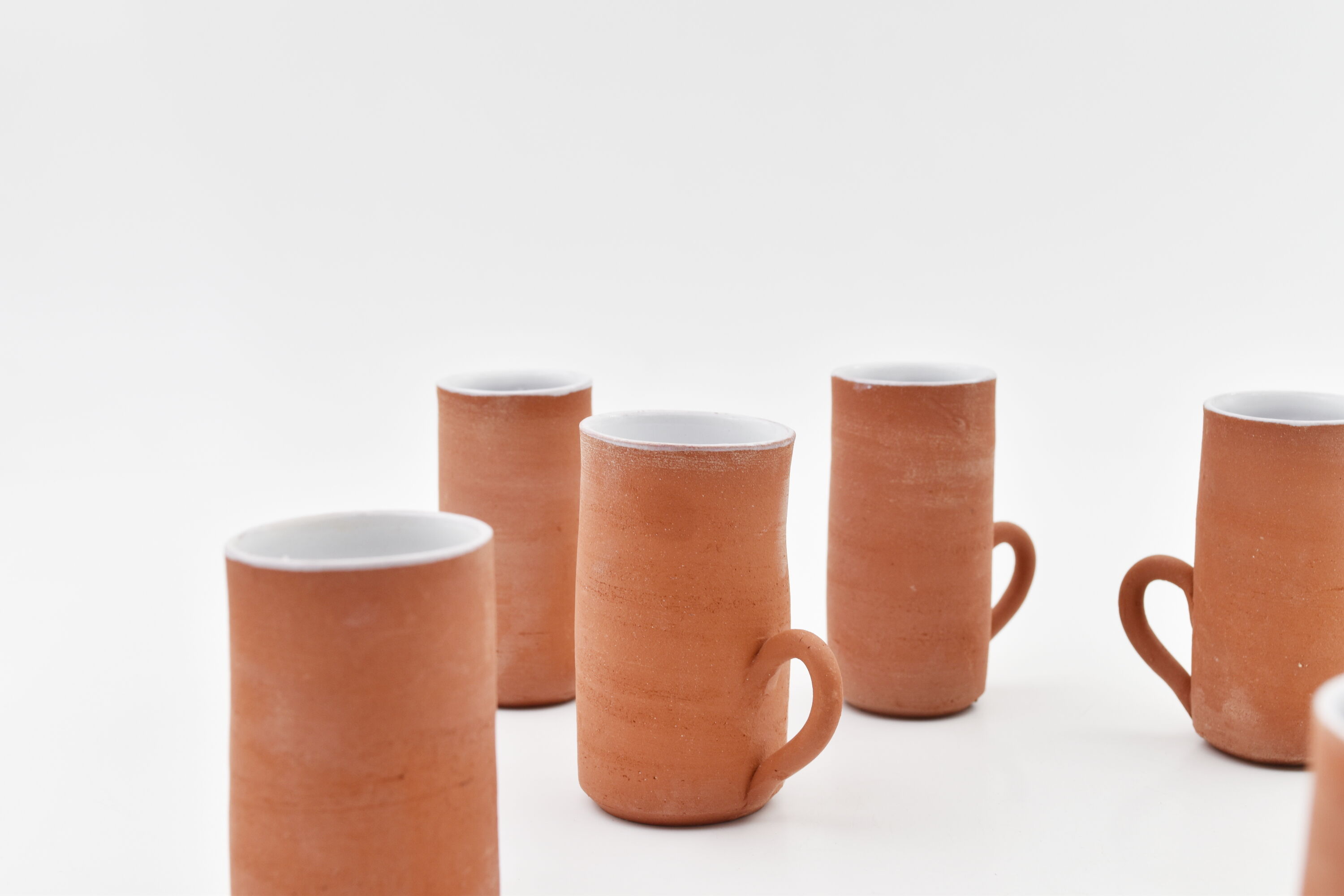 Series of six terracotta cups