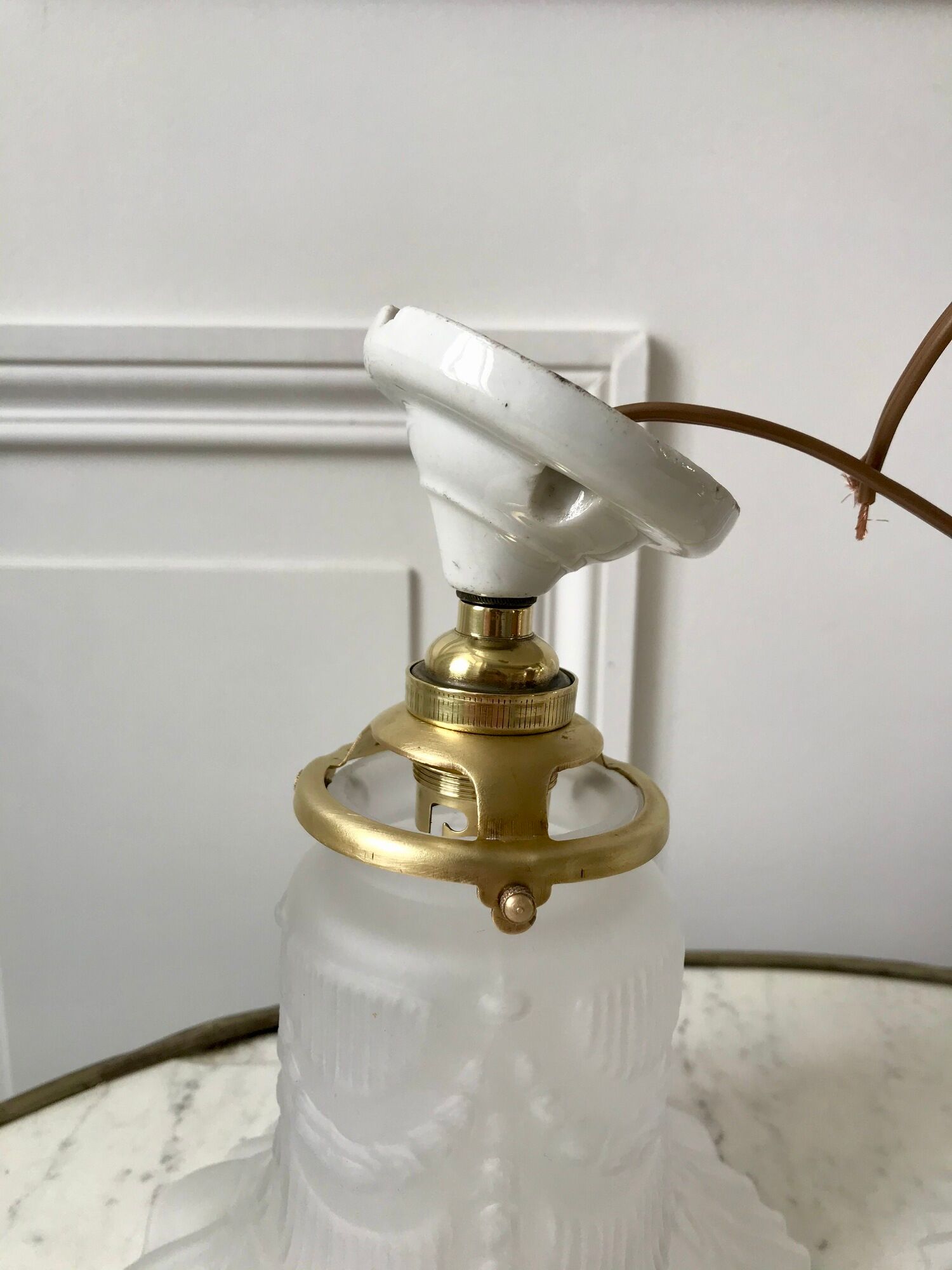 Pair of tulip wall lamps in molded glass on porcelain support 20s