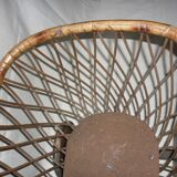 Cradle of doll in rattan on wheels