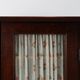 Armoire haute Art Déco française avec porte vitrée et compartiment caché, vers 1910