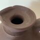 Jar and terracotta bottle